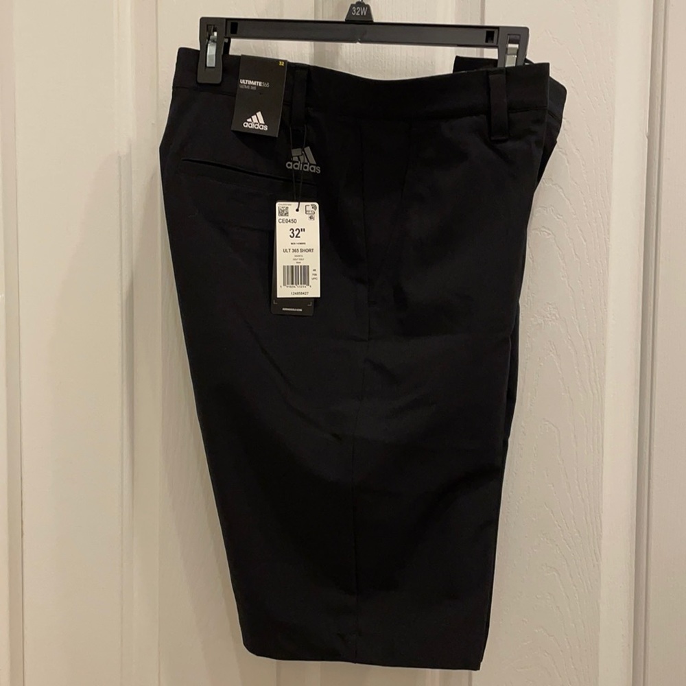 Adidas golf shorts. Black. Dri-fit material.